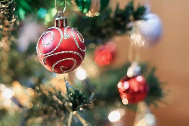 Christmas tree decorations on the branches background