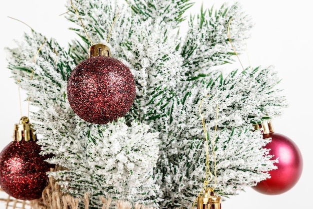 Christmas tree gift boxes with toys on a white background