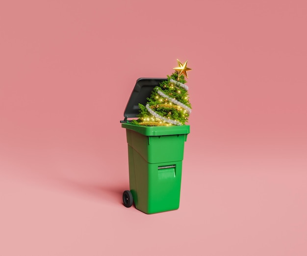 Christmas tree in green trash bin