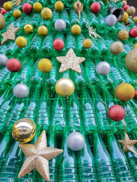 Christmas tree made from recycled plastic bottles with decorations