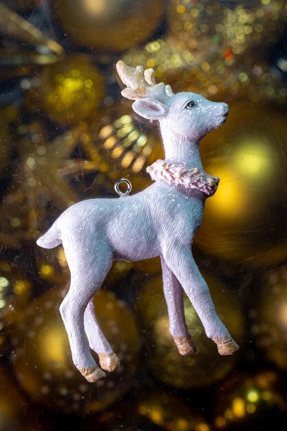 christmas tree toy white fawn on the background