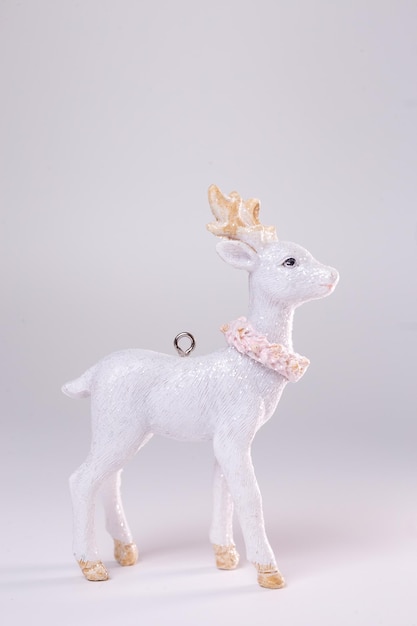 christmas tree toy white fawn on a white background