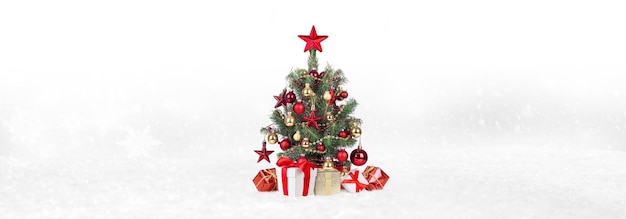 Christmas Tree with decoration on a winter background.