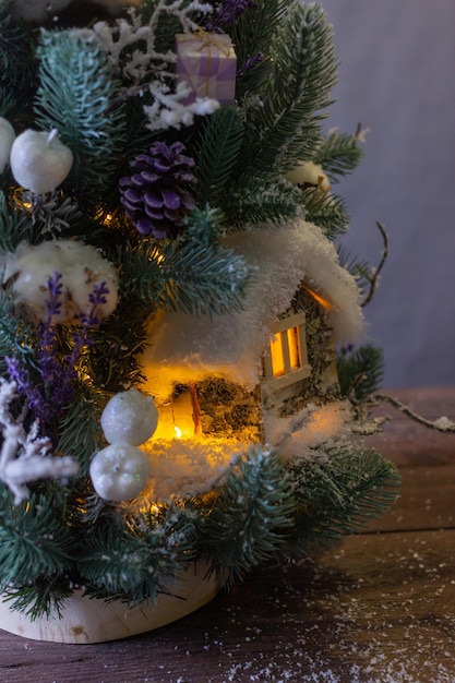 Christmas tree with decorations and houses