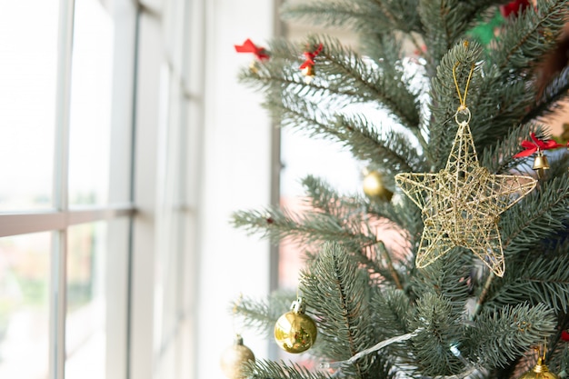 Christmas tree with star decoration in living room , Christmas  