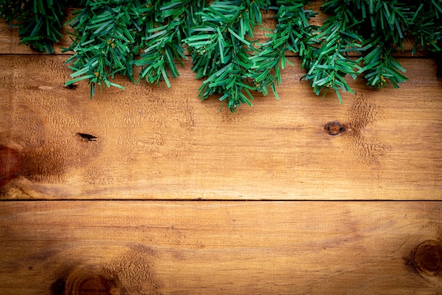 Christmas tree on wood background