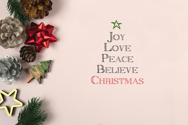 Christmas wishes in the form of a tree joylovepeacebelievechristmas background with inspirational te...