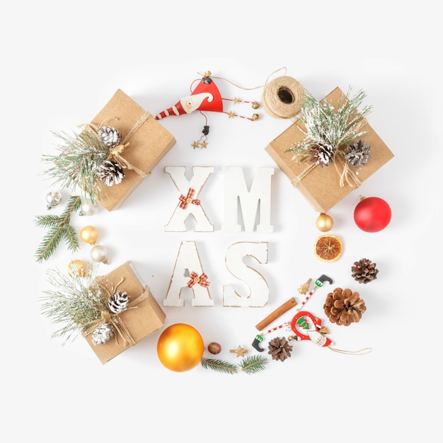 Christmas  word Xmas wreath Christmas decoration white  top view New year flat lay