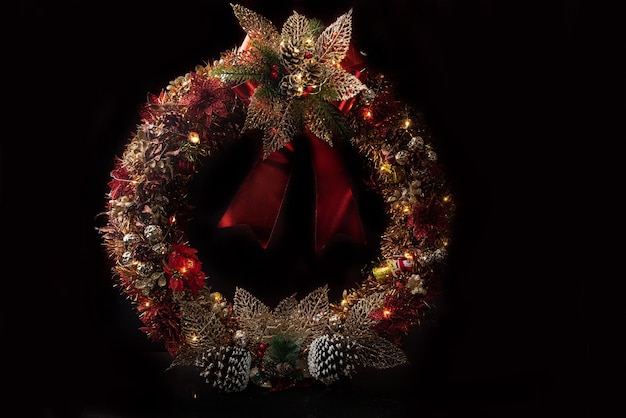 Christmas wreath beautiful Christmas wreath all decorated with black background selective focus