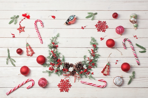 Christmas wreath on white wood