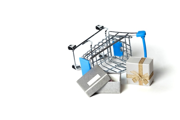 Chrome plated wire metal square shopping basket isolated with gift on white surface