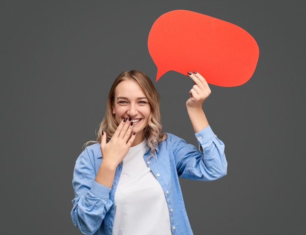 Chuckling female with speech bubble