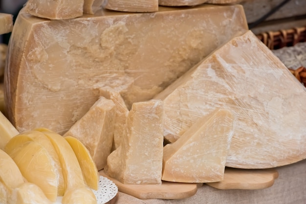 Chunk of Parmesan cheese at outdoor market