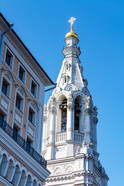 Church Recovery of the Fallen icon of the mother of God in the Middle Gardeners on Sofiyskaya Embankment in Moscow against blue sky