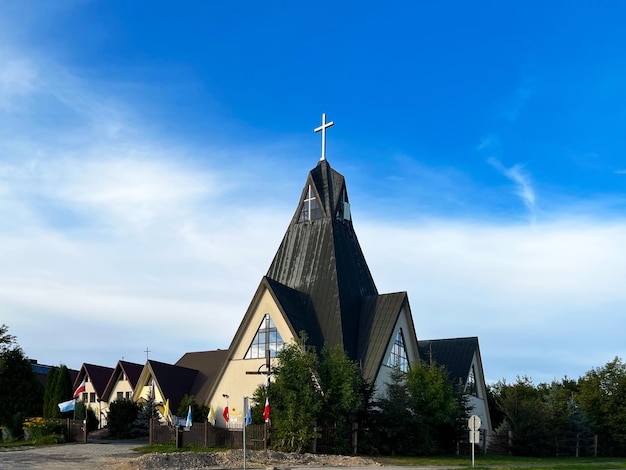 The Church of St. John of Dukla against the blue sky