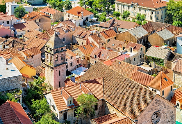 Church tower and roofs of buildings in the old town of Omis, Croatia