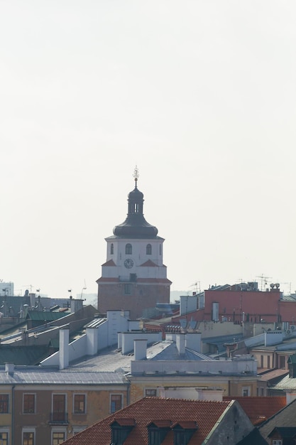 A church tower with a clock on the top of it