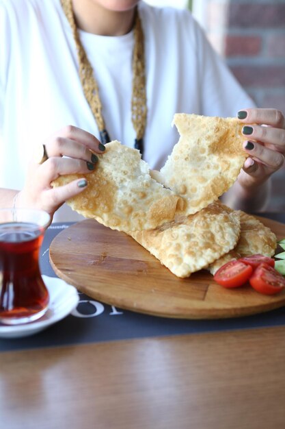 Ciborek is a traditional pastry in Turkish cuisine. Ciborek is a half-moon shaped borek, filled with