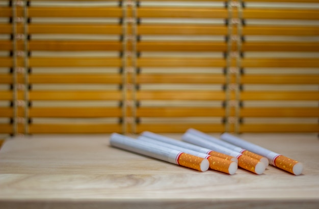 cigarettes on wooden table