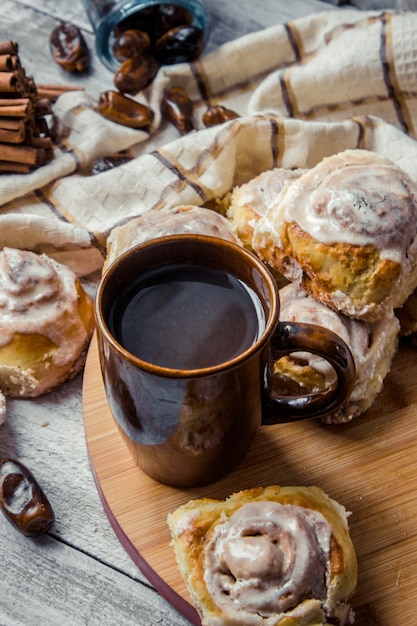 Cinnabon cinnamon and cream for tea. Selective focus.