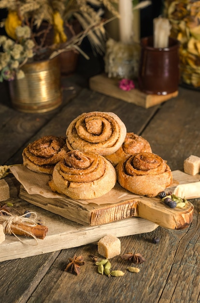 Cinnamon buns on a wooden table