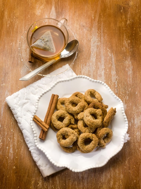 Cinnamon cookie with cup of tea