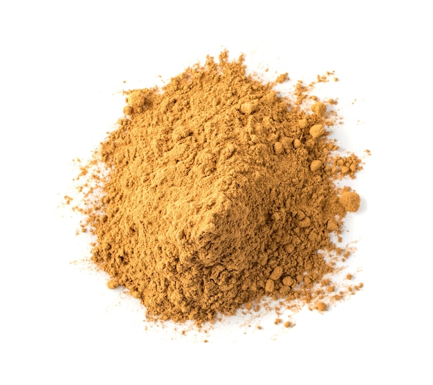 Cinnamon Powder Isolated. Ground Cinamon Bark Closeup and Top View