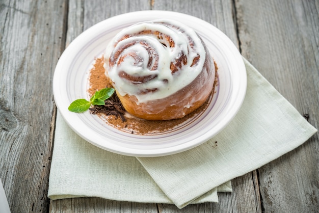 Cinnamon rolls with almond on the table.