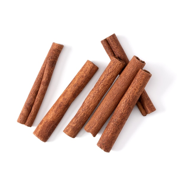 Cinnamon sticks isolated on white background closeup Canella spice Aromatic condiment background Flat lay top view