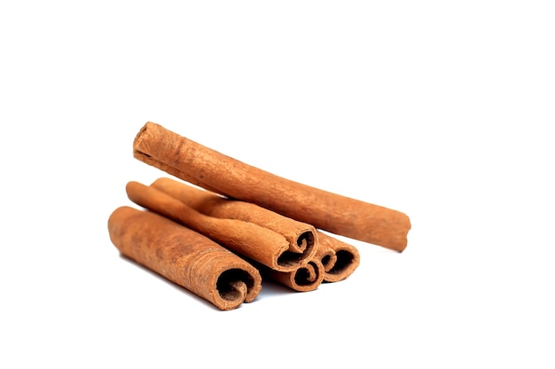 Cinnamon sticks on white background