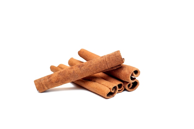 Cinnamon sticks on white background