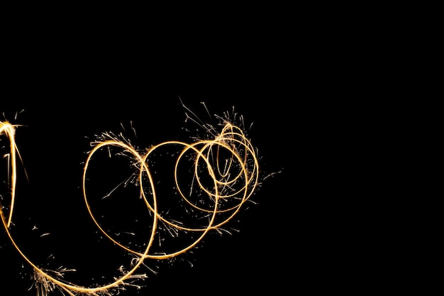 Circular lights with sparks on a black background