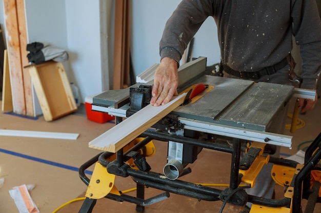 Circular saw cutting wooden plank closeup blade concepts