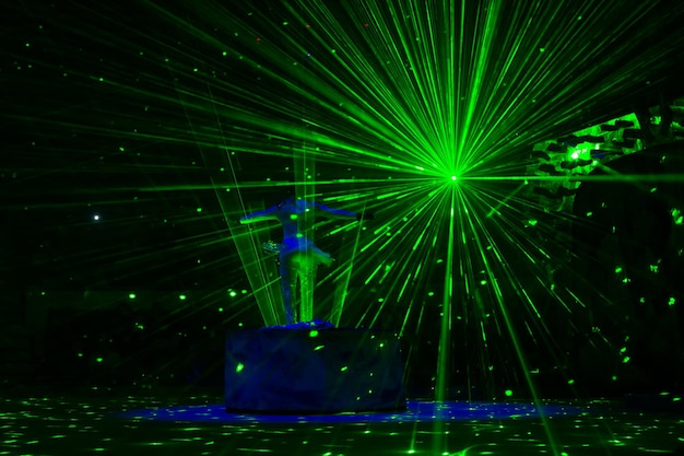 circus laser show performance in complete darkness