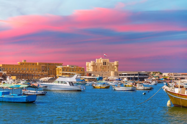 Citadel of Qaitbay famous fort in the Mediterranean harbour of Alexandria beautiful sunset view Egypt