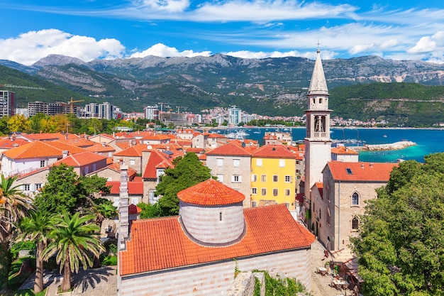 Citadel and the tower of St John the Baptists Church, Budva old town aerial view, Montenegro.