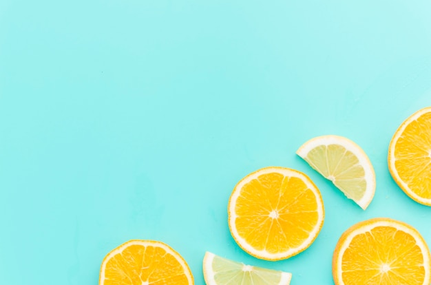 Citrus fruits slices on table