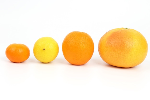 Citrus fruits on a white 