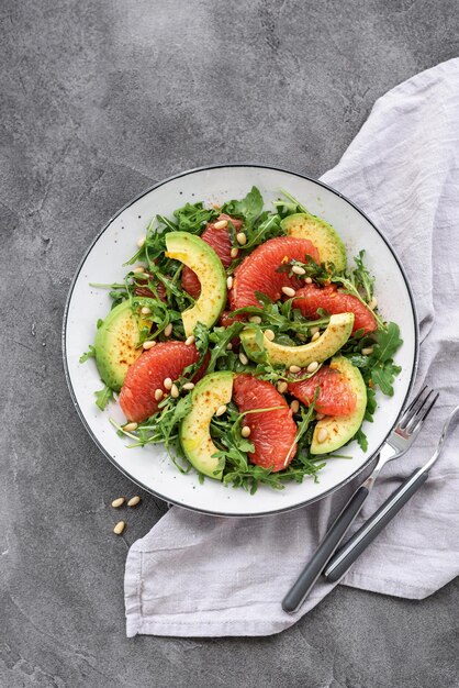 Citrus salad with grapefruit arugula and avocado Light vegetarian salad