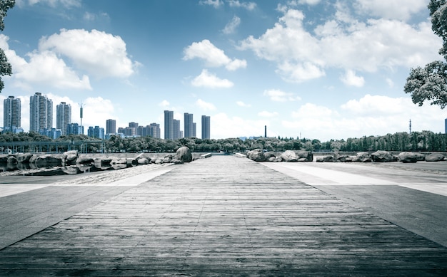 City park under blue sky with Downtown Skyline in the Background