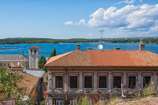 City of Pula skyline and view to adriatic sea harbor in summer