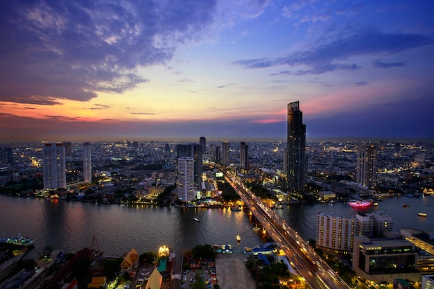 City at riverside in twilight scene at Bangkok, Thailand