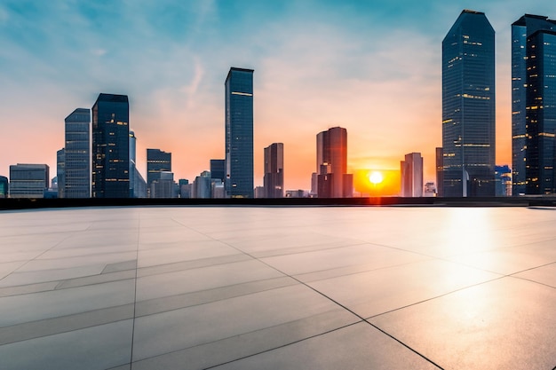 a city skyline with a sunset in the background