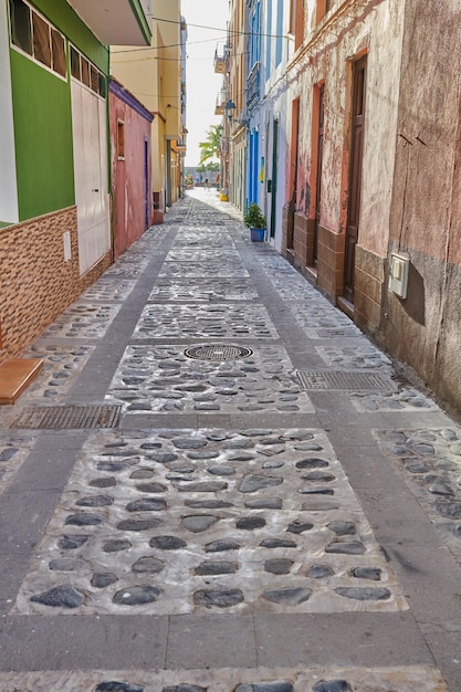 City street view of residential houses or buildings in leading alleyway in Santa Cruz La Palma Spain Historical spanish and colonial architecture in tropical village and famous tourism destination