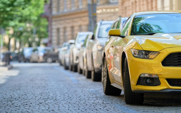 City traffic with cars parked in line on street side