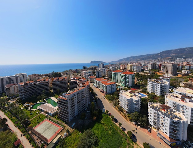 A city with a blue ocean in the background