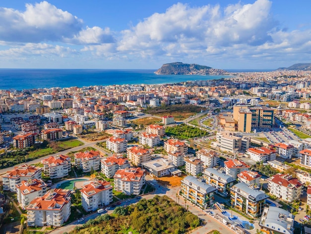 A city with a mountain in the background