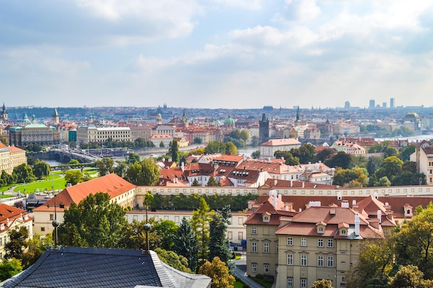 a city with a red roof and a large building with a red roof Czech Republic Prague Sights