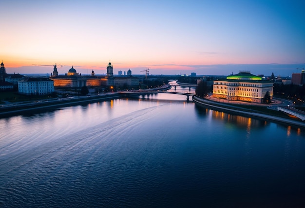 Photo a city with a river and a bridge with a city in the background