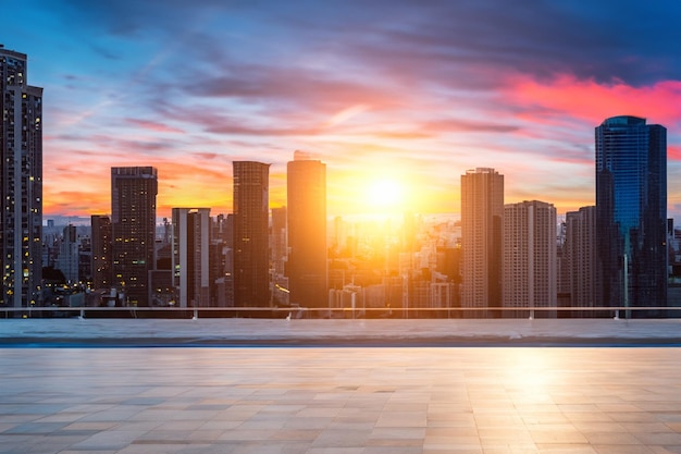 a city with a sunset in the background